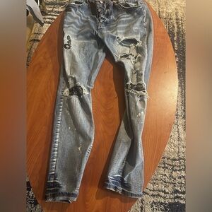 AMIRI Blue Distressed Skinny Jeans